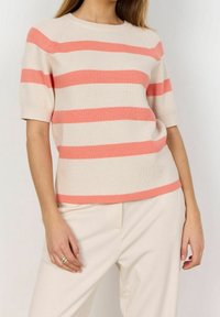 Cotton-blend short-sleeve sweater in cream with horizontal coral stripes. Features a ribbed texture and a crew neckline.