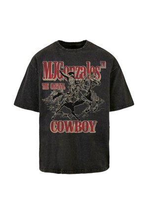 Musta graafinen t-paita, jossa on cowboy hevosella, ja jossa lukee "MJ Gonzales™ THE ORIGINAL COWBOY" rohkealla punaisella tekstillä. Pehmeää puuvillakangasta.