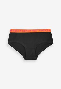 Culotte noire en coton avec une large ceinture en néon orange affichant le logo "NEXT" répété. Texture lisse, coupe classique.