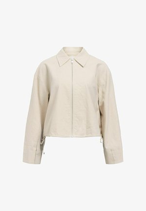 Beige verkürzte Jacke mit einem umgeschlagenen Kragen, vorderem Reißverschluss und langen Ärmeln. Verfügt über verstellbare Bindebänder am Saum.