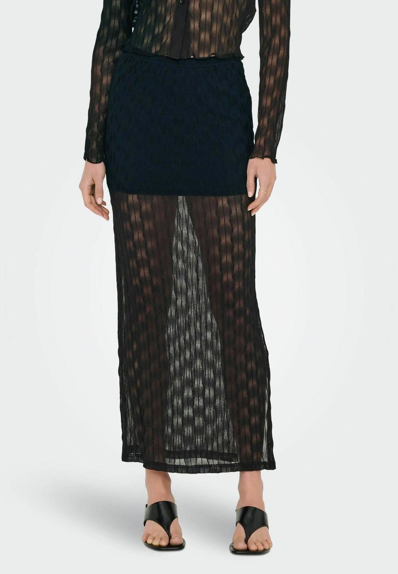 Sort maxi nederdel med gennemsigtigt, tekstureret stof, der har lodrette striber. Designet har en elastisk talje og en tætsiddende inderforing.