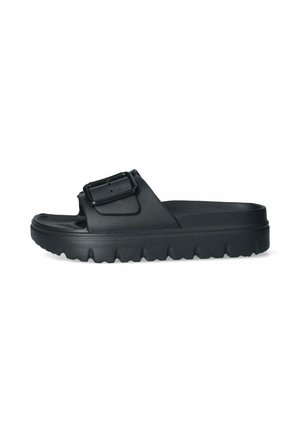 Sandalo nero slip-on con suola spessa scanalata e cinturino regolabile con fibbia sulla parte superiore, design con punta aperta.