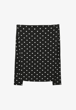 Zwarte lange mouwen shirt met witte stippen, rechte zoom en een getailleerde silhouet.