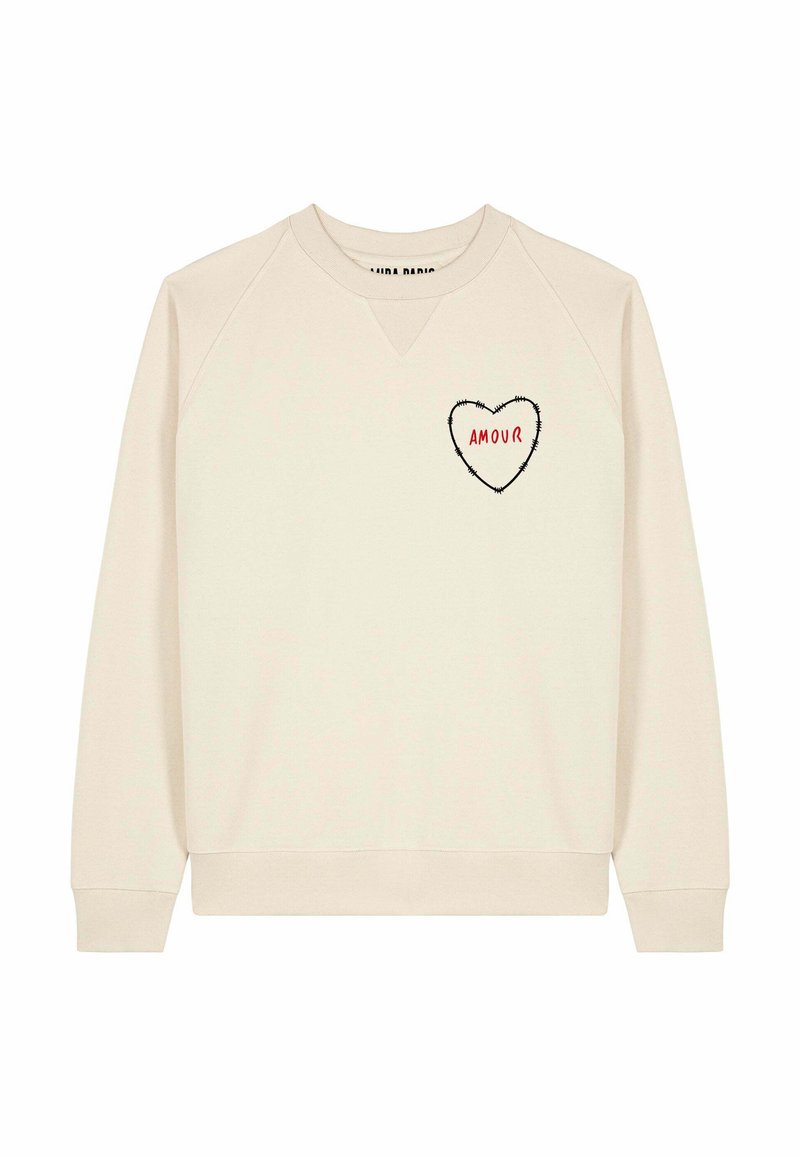 Felpa beige con scollo rotondo e maniche raglan. Presenta una grafica a forma di cuore con la scritta "AMOUR" in rosso sul petto a sinistra.