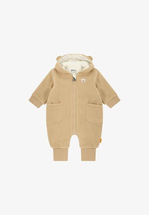 Tutina per neonati in pile beige con cappuccio, orecchie da orso, zip frontale, due tasche anteriori e applicazione di un orso. Texture morbida, polsini elastici.
