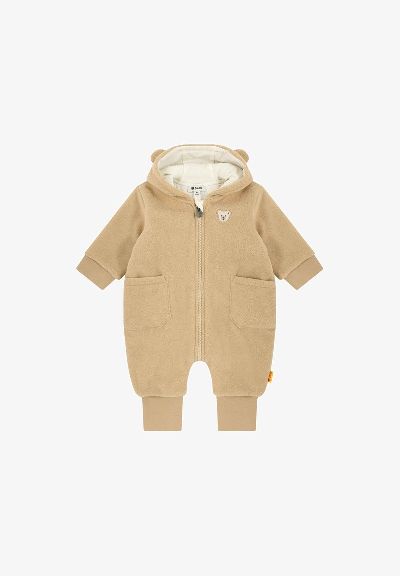 Beige Fleece Baby Overall mit Kapuze, Bärenohren, Frontreißverschluss, zwei Vorderentaschen und Bärenapplikation. Weiche Textur, elastische Bündchen.