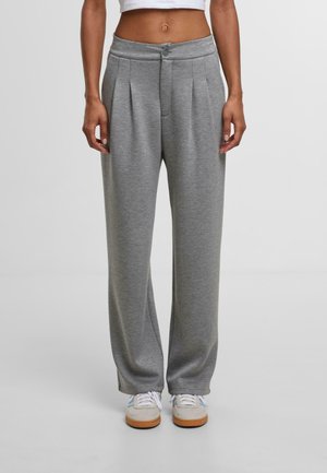 Grå sweatpants med en løs pasform, plisser foran og knaplukning. Fremstillet af blødt stof, med en glat overflade og bred ben-design.