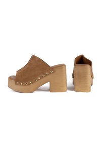 Brown suede slide sandals with a high block heel, featuring gold studs along the edge and a smooth wooden base. Open toe design.