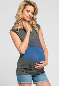 Maternity top, featuring a color-block design in gray, blue, and green. Short sleeves, soft fabric, with a stretchable bottom section.