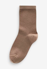 Calzino di cotone marrone con una texture liscia, dotato di una parte superiore risvoltata e una punta rinforzata per la durata. Forma arrotondata con design senza cuciture.