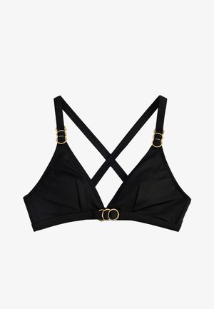 Soutien-gorge triangle noir avec bretelles croisées et anneaux dorés sur les bretelles et la bande centrale devant.