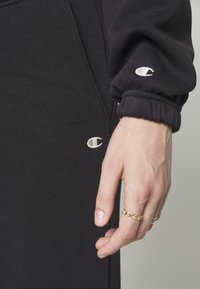 Champion Rochester ELASTIC CUFF PANTS - Treningo apatinė dalis - black