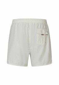 Lichtbeige zwembroek met elastische tailleband en achterzak. Gemaakt van nylon met een gladde textuur. Heeft kleine logostrepen op de zak.