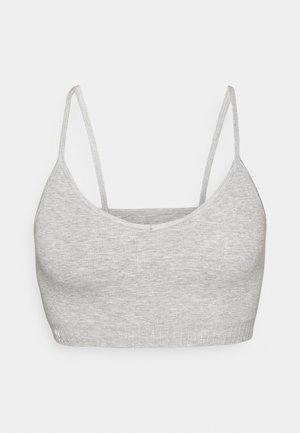Graue gerippte Bralette mit dünnen verstellbaren Trägern und Rundhalsausschnitt. Dehnbares Material mit weicher Textur, das einfarbig gestaltet ist.