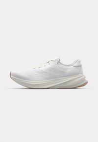 SUPERNOVA RISE - Tenisice za cestovno trčanje - beige
