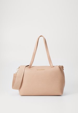 Light pink leather handbag with two top handles and a removable shoulder strap. Features a gold logo and smooth texture. Zipper closure.