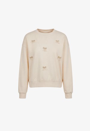 Cremefarvet langærmet sweatshirt med seks små dekorative guldsløjfer på fronten, rund halsudskæring, og ribbet manchetter og kant.