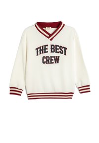 Pullover bianco con scollatura a V, caratterizzato da un ricamo in rosso e blu con la scritta "THE BEST CREW." Polsini e orlo a coste rigate rossi. Morbido al tatto.