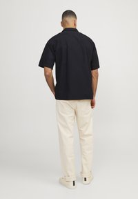 R.D.D. ROYAL DENIM DIVISION Marškiniai - black