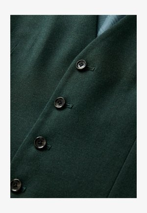 Dunkelgrünes Woll-Blazer mit vier schwarzen Knöpfen, taillierten Revers und glatter Textur mit dezenten Nähten.