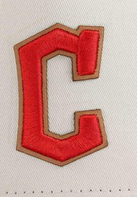Red embroidered letter "C" outlined in brown on a light gray fabric background, featuring a smooth texture and clean lines.
