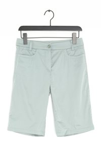 Světlé zelené, krátké kalhoty po kolena s knoflíkovým zapínáním, předními kapsami a hladkým povrchem, zavěšené na černém plastovém ramínku.