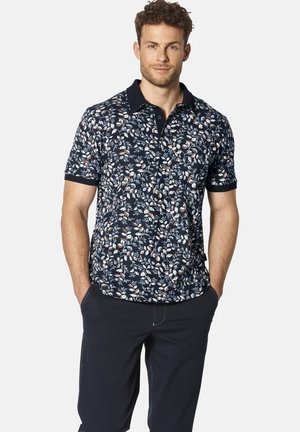 Kurze Ärmel Poloshirt in Dunkelblau mit floralen Mustern, die weiße und rostfarbene Akzente zeigen, mit Knopfkragen und leichtem Stoff.