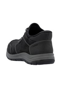 Scarpe in suede nere con punta rotonda e suola grigia, con accenti cuciti e design con lacci per una vestibilità sicura.