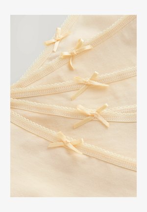 Soft peach fabric with delicate lace trim, featuring small satin bows at even intervals. Smooth texture and curved neckline design.