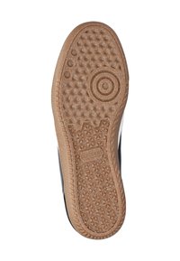 Schoenzool in bruin rubber met een patroon van cirkelvormige en stervormige ontwerpen, gelabeld 'Skechers.'