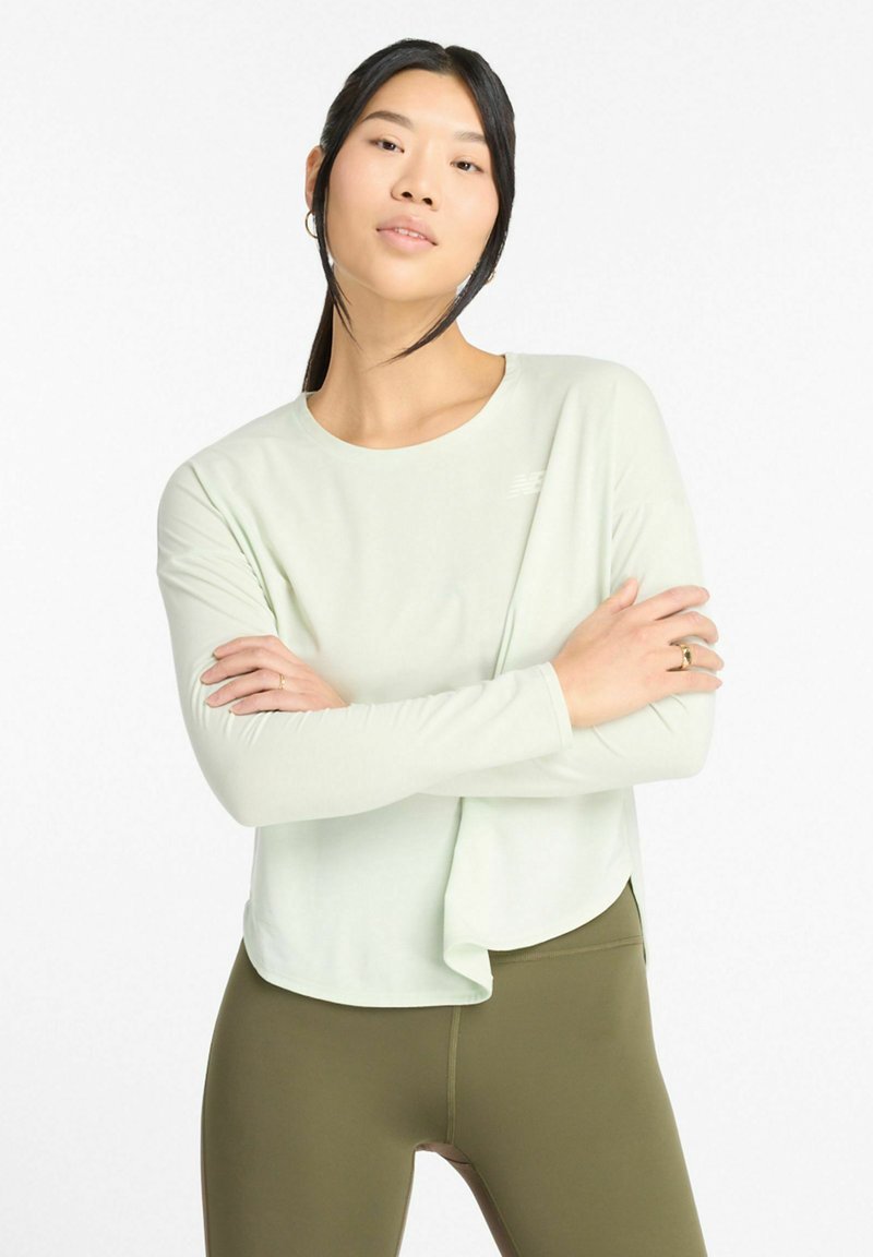 New Balance Longsleeve groen New Balance Longsleeve groen