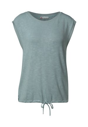 Světle modrý top s krátkými rukávy a volným střihem, kulatým výstřihem a šňůrkovým lemem pro nastavitelné délky. Vyrobeno z měkké, texturované tkaniny.