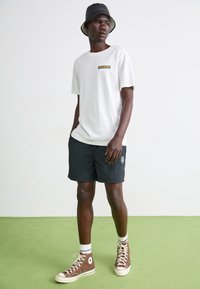 Converse RETRO CHUCK ELEVATED - Tréningruha alsók - black