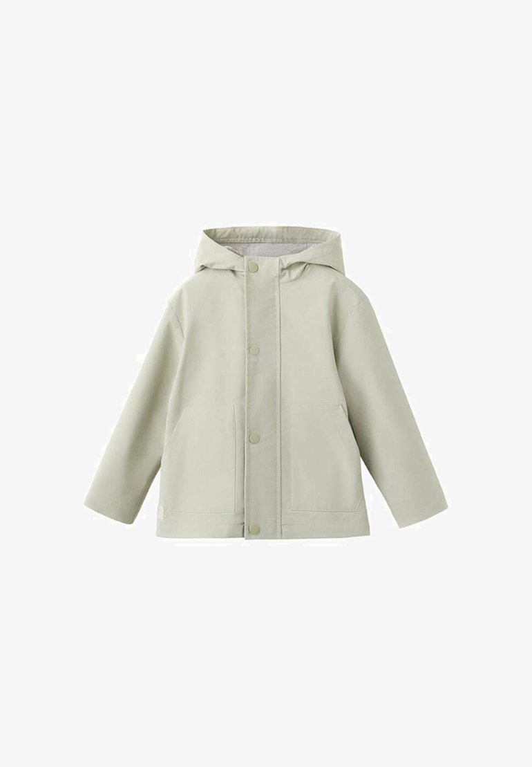 Veste à capuche beige clair avec boutons-pression à l'avant et deux grandes poches frontales, présentée sur un fond blanc.