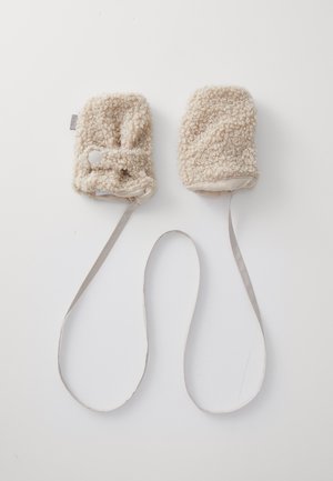 Beige bolyhos kesztyűk texturált felülettel, gombos záródással és hosszú, lapos pánttal. Puha, meleg anyag, ami szoros illeszkedést biztosít.