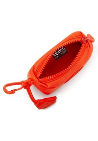 Kipling orange zippered pouch with a smooth texture, featuring a round zipper pull and a logo tag inside, compact and lightweight design.