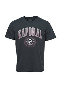 Czarna bawełniana koszulka z wyraźnym czerwono-białym logo "KAPORAL" oraz okrągłą grafiką z napisem "SOUTH VARSITY" i wzorem laurowym.