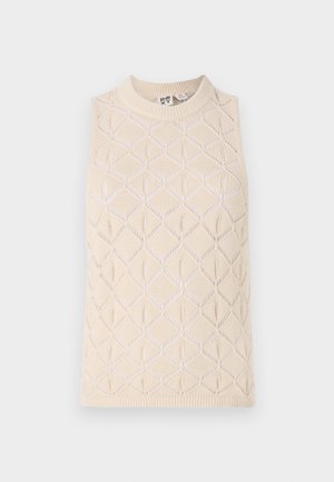 Top sin mangas de punto crema con un patrón de diamantes, cuello acanalado y textura. Fabricado con un hilo suave que ofrece una sensación ligera y transpirable.