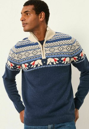 Navy Pullover mit Reißverschluss am Kragen, ausgestattet mit einem Fair Isle-Muster in Creme, Blau und Rot, das Eisbären und geometrische Designs darstellt.