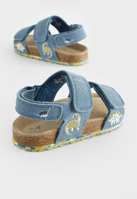 Next Lära-gå-skor - blue dino