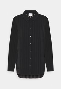Chemise noire à manches longues avec des rayures verticales, fermeture à boutons à l'avant et col classique. Présente un ourlet arrière légèrement allongé.