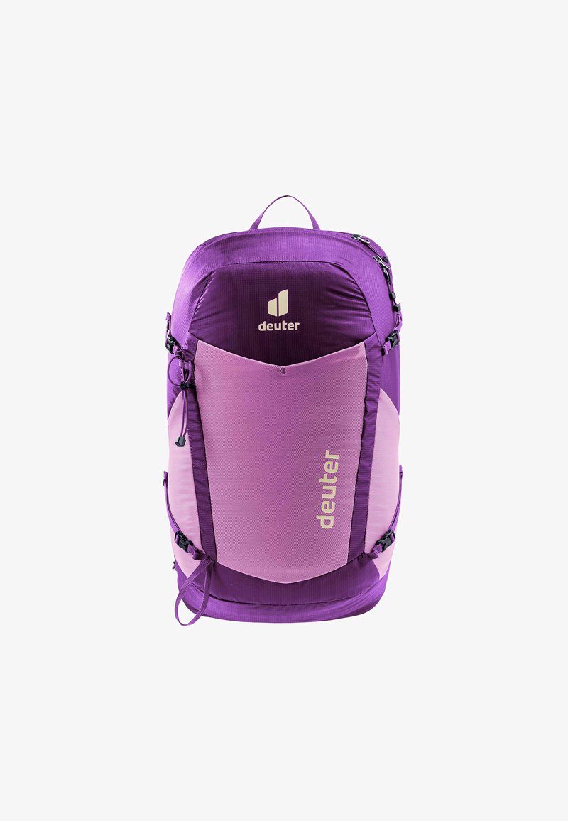 Lilla ryggsekk med to-farget design, som har en teksturert stoff, topphåndtak og glidelåser. Merkevaren logo trykt på fronten.