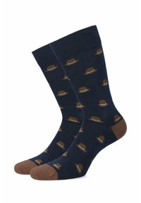 Granatowe skarpetki w wzór z brązowym kapeluszem bowler; ściągacz, kontrastowy brązowy czubek i pięta, gładka tekstura, materiał z mieszanki bawełny.