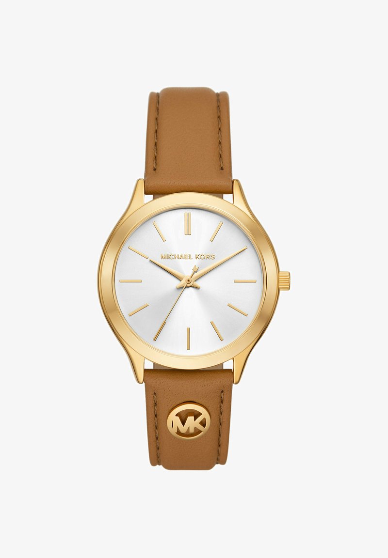 Gold-tone wristwatch with a silver dial, brown leather strap, and an engraved MK logo on the band. Features minimalistic hour markers.
