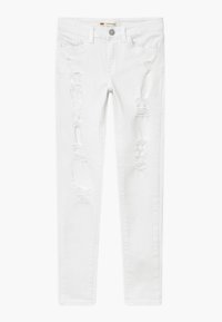 Vaqueros pitillo de denim blanco con múltiples desgastes y bordes deshilachados. Cuenta con una cinturilla estándar y un diseño de cinco bolsillos.