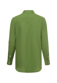 Camicia verde a maniche lunghe con un tessuto leggermente strutturato, polsi abbottonati e colletto classico. La vista posteriore mostra un taglio dritto e cuciture a vista.