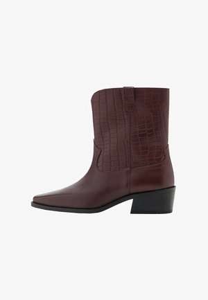 Maroon leather ankle boots with a textured crocodile pattern, pointed toe, and a low block heel. Features stitching along the sides.