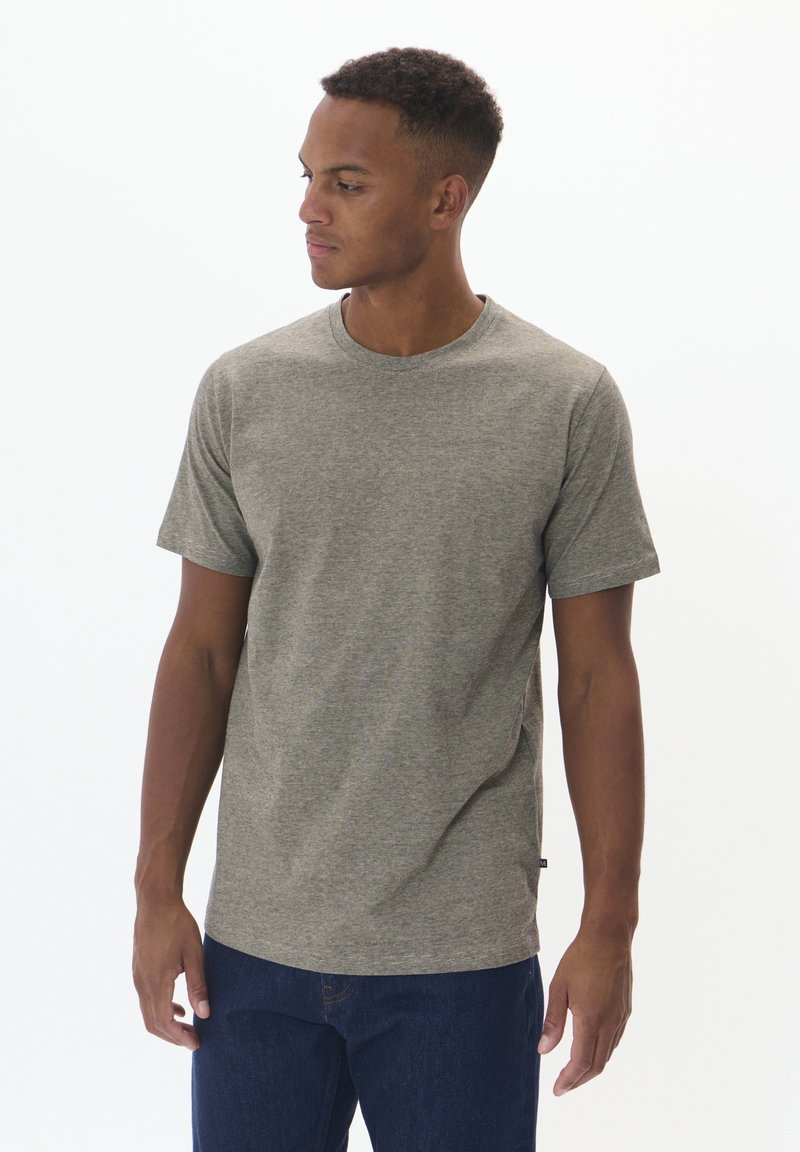 Gray short-sleeve t-shirt with a round neck, made of a textured fabric, featuring a subtle vertical stripe pattern and a side tag detail.