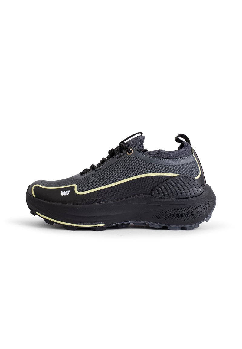 Black athletic shoe with a textured upper, reinforced toe cap, and rubber sole. Features a yellow outline and adjustable laces for fit.
