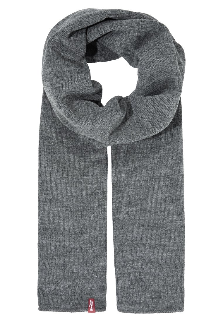 Grau gestrickter Schal mit einer weichen Textur, der rechteckig geformt ist und an einem Ende ein kleines Logo-Tag aufweist. Das Material wirkt warm und strapazierfähig.
